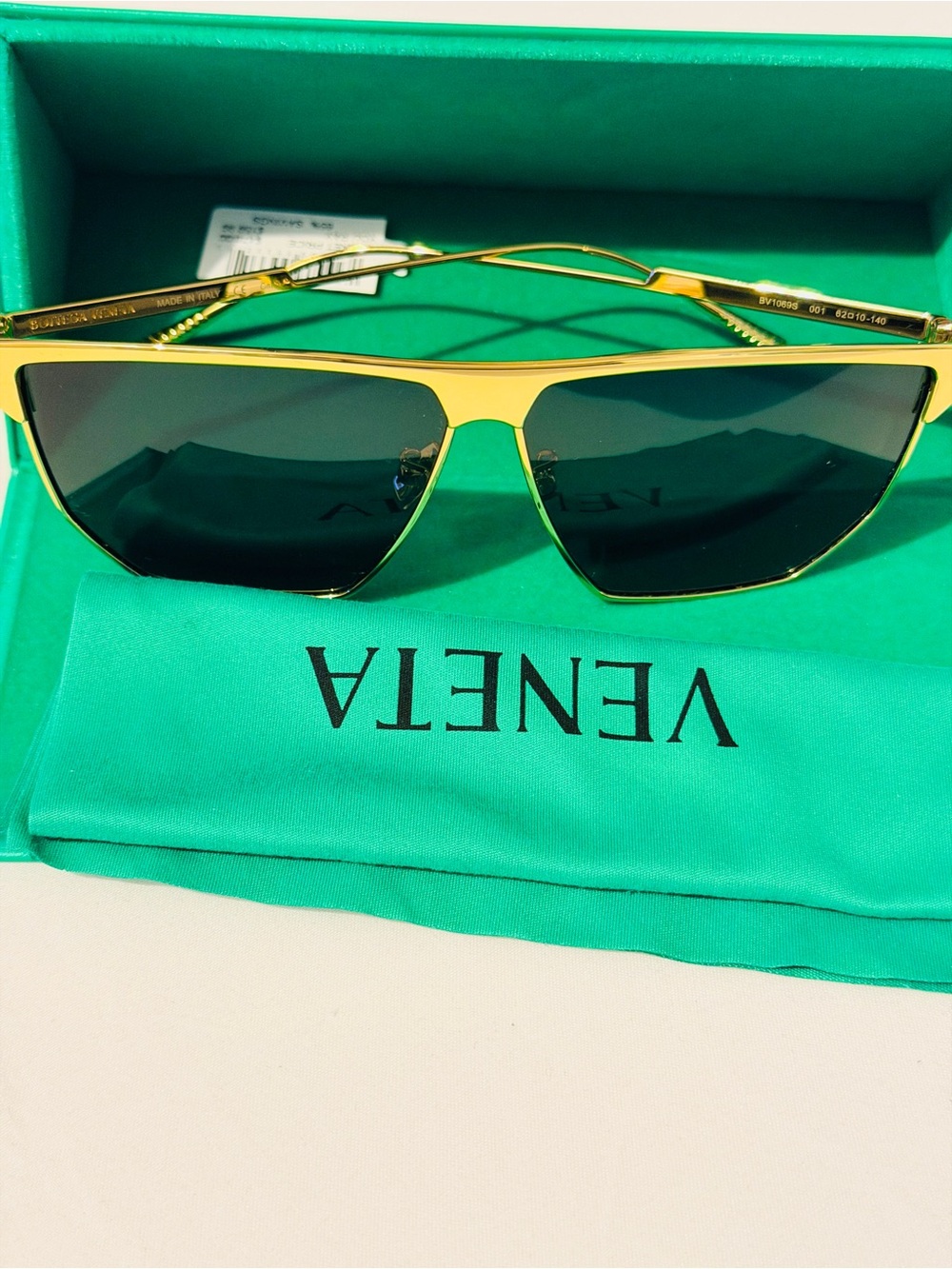 Bottega Veneta Gold Metal Frame Sunglasses with Dark Lenses